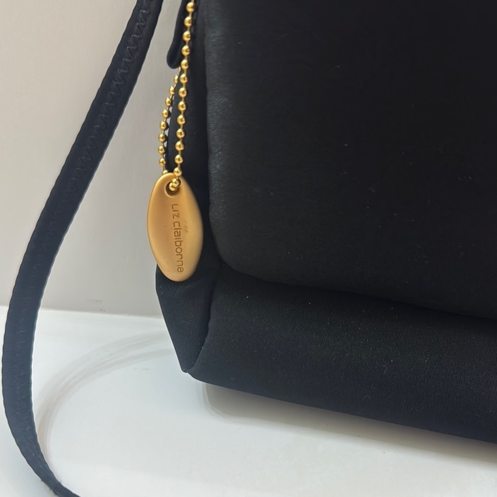 Liz Claiborne Elegant Black Crossbody Bag. Gold colored accents. Skinny strap. - Picture 2 of 9